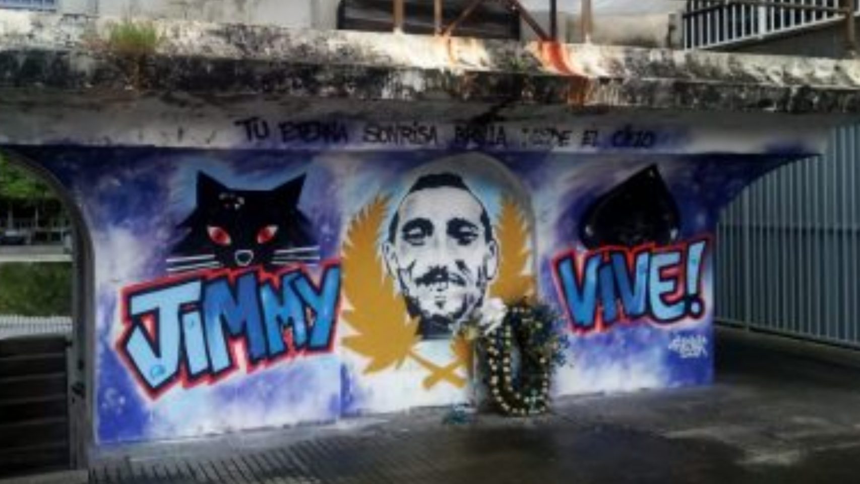 Un graffiti con la cara de Jimmy, el hincha del Deportivo fallecido.