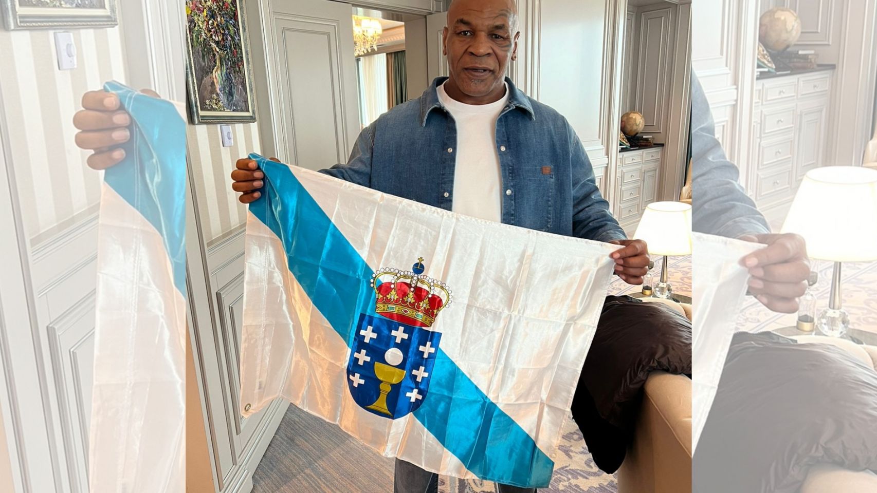 Mike Tyson posa con una bandera de Galicia